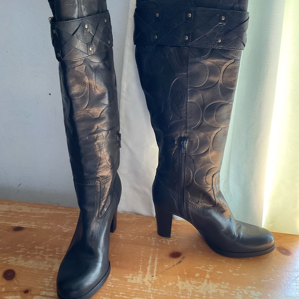 Coach black leather knee high heeled boots.  Size 9.5